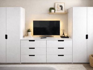 White wardrobe and drawer storage set with central TV space, featuring two tall wardrobes and six drawer unit made from strong 18mm HDF, modern bedroom storage furniture.