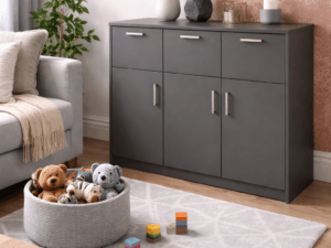 POLLY 6 Door Storage Cabinet in dark grey shown in a modern family living room with silver bar handles and spacious toy storage compartments.