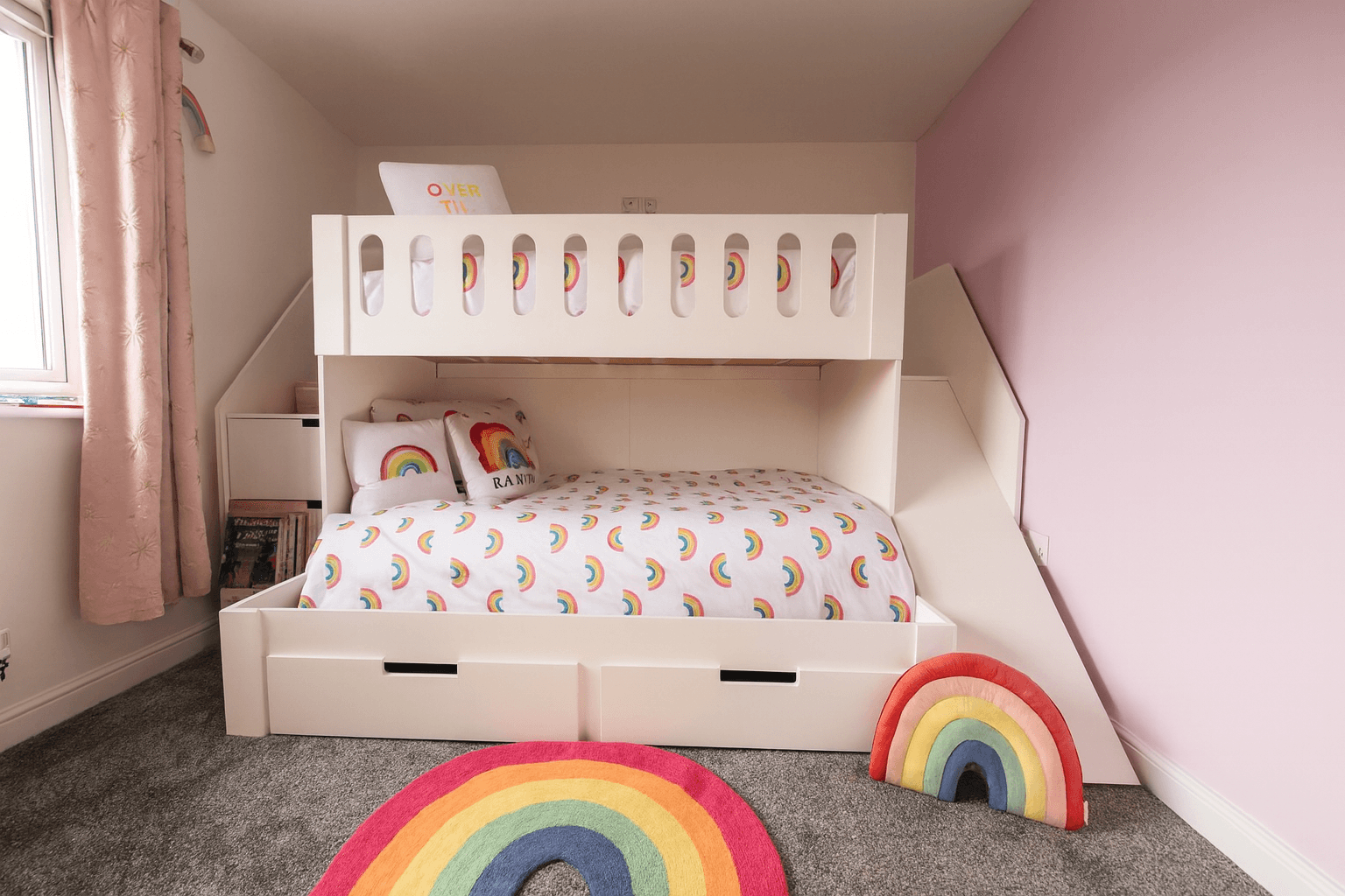 bunk bed with stairs and slide and double on bottom, in white.