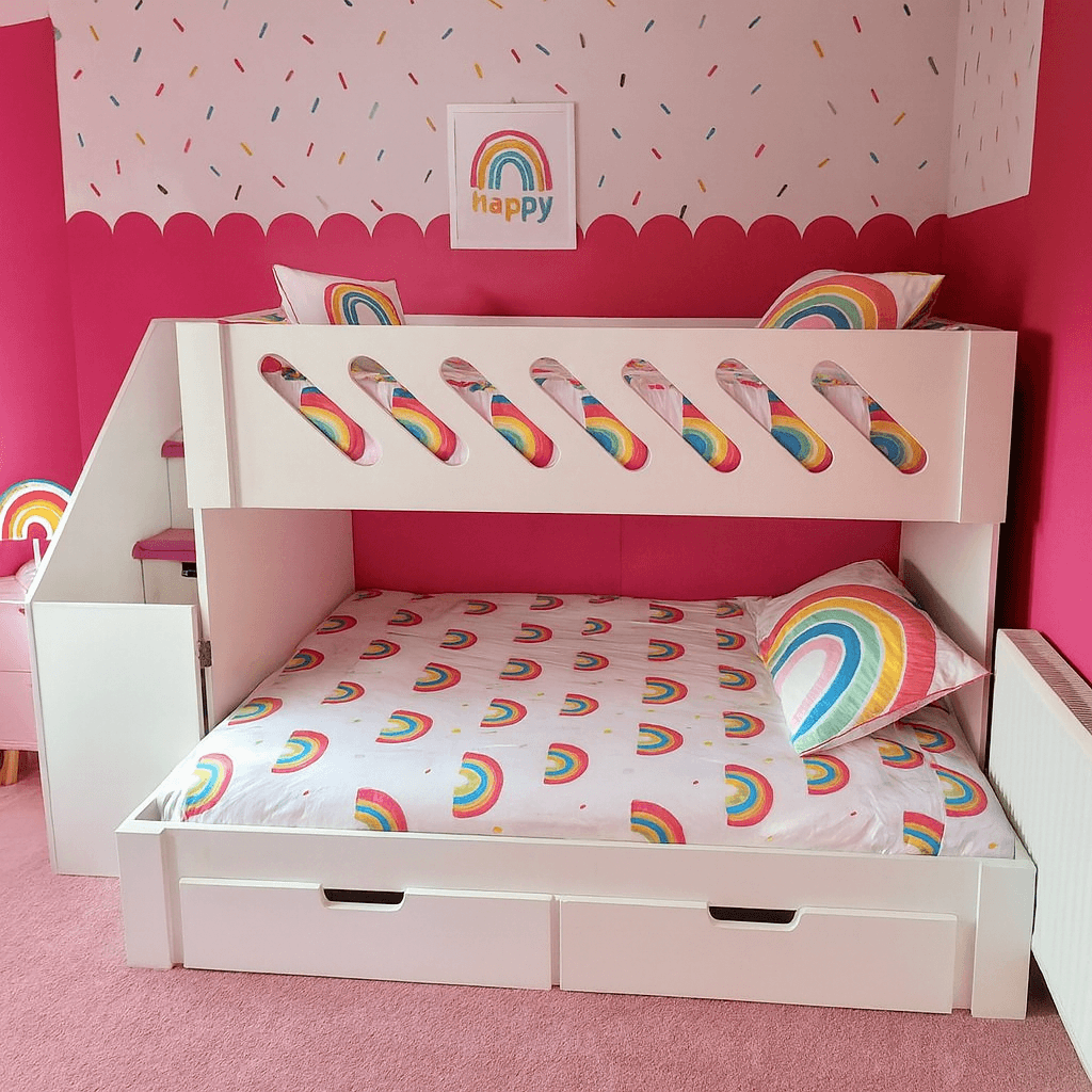 Storage standard triple bunk bed with double on bottom and drawers under bottom bunk in pink rainbow theme bedroom