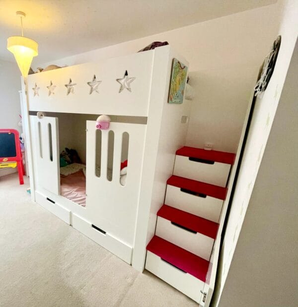 Bunk Bed with cot rail, drawers, stairs, carpet, stair gate.