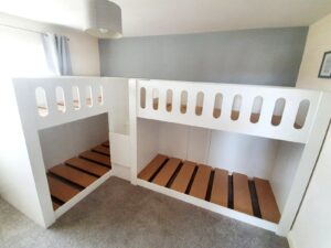 white quad bunk. stair case. stair gate. sleeps 4. bespoke design