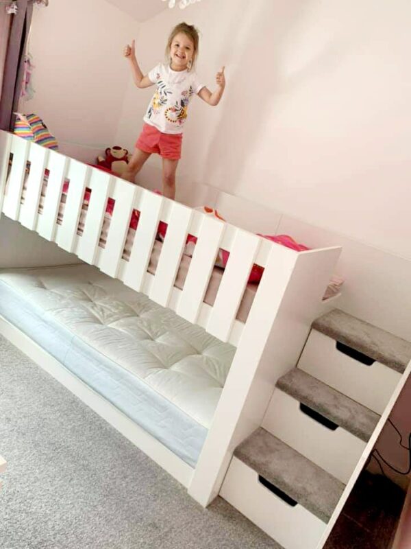 standard bunk bed with stairs. 4ft high. drawers in the stairs. carpet on the stairs. kids beds. storage