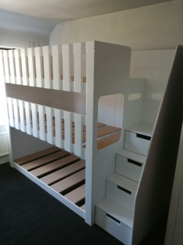 triple tier bunk. space saving. bunk bed. sleep 3. in white. stair case. drawers in the stairs.