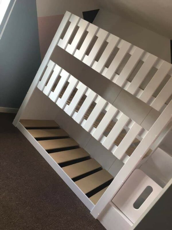 triple tier bunk. space saving. bunk bed. sleep 3. in white. stair case. gate on the stairs