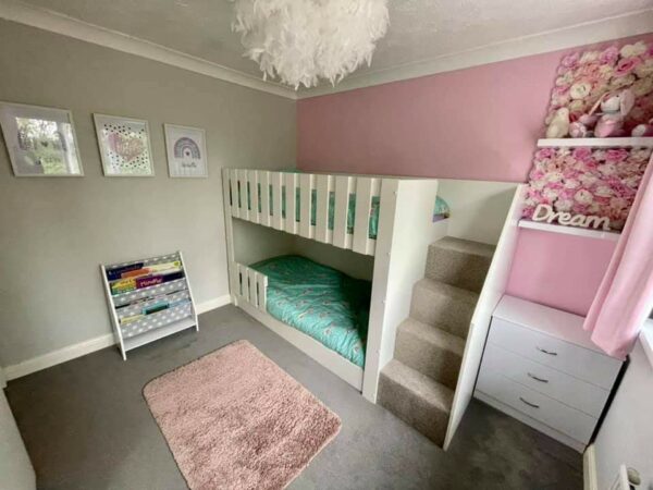 5ft high standard bunk bed with stair case. carpet on the stairs. bed guard.