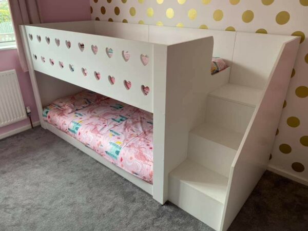 bunk bed with stairs. heart cut outs on top rail. girls.