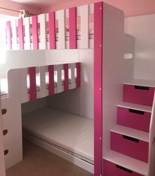 jenga triple bunk bed in white and pink. stair case and ladder. girls bunk. drawers storage in the stairs.