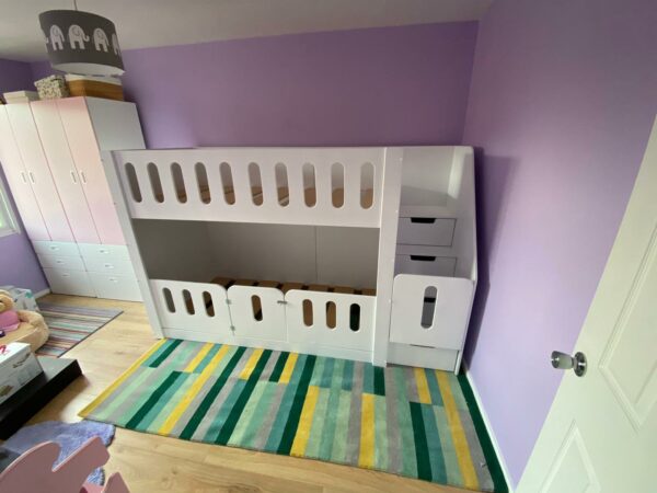 cot bunk bed. cot rail. drawers in the stairs. stair gate. white.