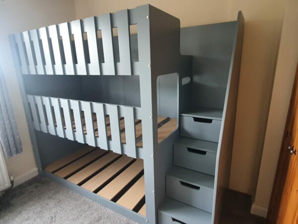 triple tier bunk in dark grey. bunk bed. drawers in the stairs. funky bunk beds. bunk bed with stairs