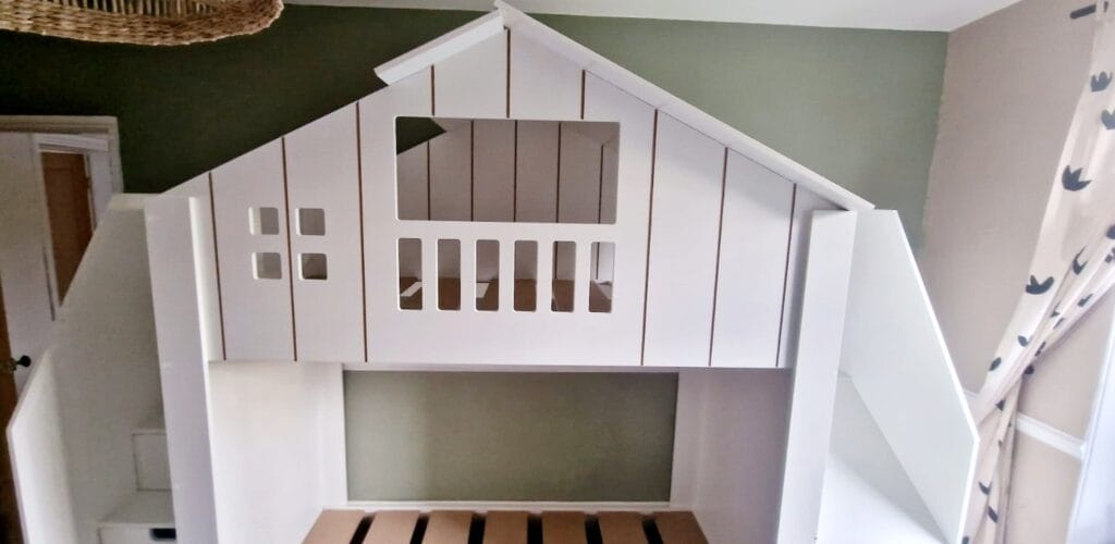 Tree House Top Rail On Bed.