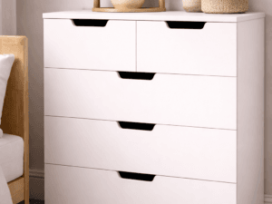 POLAR 5 drawer chest with recessed handles displayed in a modern bedroom